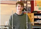  ??  ?? Finnegan Messerli, 18, created a way of testing the properties of grains such as sand or salt without expensive equipment.