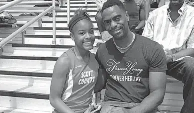  ??  ?? Tyson Gay and his 15-year-old daughter, Trinity. (Photo: Kentucky)