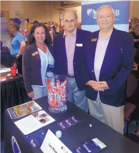  ?? COURTESY OF LANB ?? Los Alamos National Bank wealth strategy staffers market their services around the state, such as a recent New Mexico Bar Associatio­n conference. Seen left to right are Katrina Johnson, Dean Cross and Bill Zaleski.