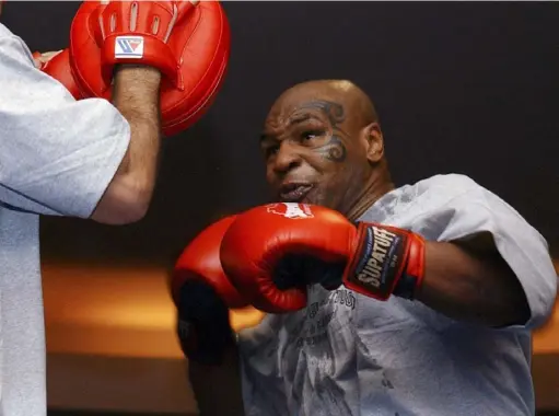  ?? Associated Press ?? Former heavyweigh­t boxing champion Mike Tyson would like to come out of retirement and stage some exhibition matches.
