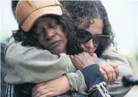  ?? STEVE RUSSELL TORONTO STAR ?? Regis Korchinski-Paquet’s sister Renee consoles their mother, Claudette, on Thursday. The family cancelled an interview with the SIU after reports of Korchinski-Paquet’s death were leaked.