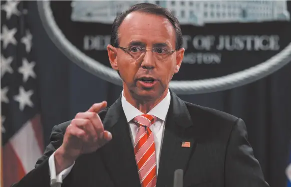  ?? CITIZEN NEWS SERVICE PHOTO BY EVAN VUCCI ?? Deputy Attorney General Rod Rosenstein speaks during a news conference at the Department of Justice, Friday, in Washington.