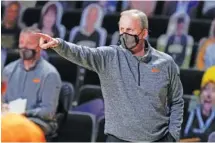  ?? AP PHOTO/MARK HUMPHREY ?? Tennessee men’s basketball coach Rick Barnes directs his players in the first half of Wednesday’s game against Vanderbilt in Nashville.