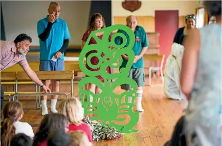  ?? PHOTO: SIMON O’CONNOR/STUFF ?? Albie McCarthy carved a sizeable tiki for Moturoa School.