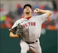  ?? Julio Cortez / Associated Press ?? Boston Red Sox starting pitcher Rich Hill throws a pitch against the Baltimore Orioles during the second inning on Friday.