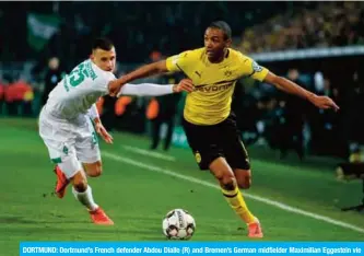  ??  ?? DORTMUND: Dortmund’s French defender Abdou Diallo (R) and Bremen’s German midfielder Maximilian Eggestein vie for the ball during the German Cup (DFB Pokal) last 16 football match BVB Borussia Dortmund v Werder Bremen in Dortmund, western Germany. — AFP