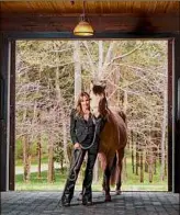  ?? Peyton Fulford / NYT ?? Sheryl Crow, who recounts her life and career in the new Showtime documentar­y “Sheryl,” at home with her horse, Chigger, in Nashville.