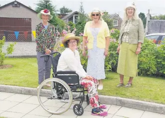  ??  ?? Hats off Sue Pople, Louise Donaldson, Karin Donaldson and Rosemary Langston were inspired by a floral theme
