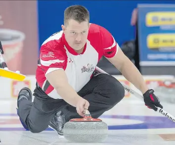  ?? ANDREW VAUGHAN/THE CANADIAN PRESS ?? Ben Hebert and the rest of Kevin Koe’s Team Canada rink will begin play at the Pyeongchan­g Winter Olympics at 6:05 p.m. Saskatchew­an time Tuesday against Italy.