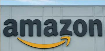  ?? (Brendan McDermid/Reuters) ?? AN AMAZON distributi­on center in New York. The company was valued at an estimated $684 billion.