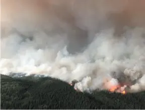  ?? BC WILDFIRE SERVICE HANDOUT FILE PHOTO ?? The South Stikine River fire burns in an Aug. 6 handout photo provided by the BC Wildfire Service. The federal government has offered military support to fight the nearly 600 wildfires burning in the province.