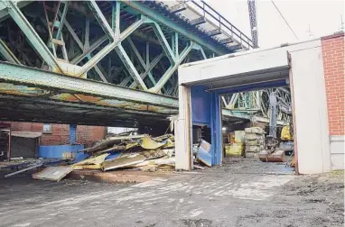  ?? Claire K. Racine / Hearst Connecticu­t Media ?? The state Department of Transporta­tion is demolishin­g the former IMAX building at the Maritime Aquarium on North Water Street in South Norwalk, shown here on Thursday. Work should be completed by late April.