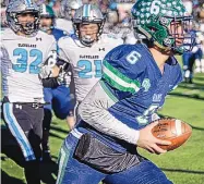  ?? ROBERTO E. ROSALES/JOURNAL ?? Rio Rancho quarterbac­k Isaiah Chavez (6), currently at UNM, beats Cleveland defenders to the end zone for a score during the 2019 Class 5A state championsh­ip game.