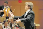  ?? ANACLETO RAPPING Los Angeles Times ?? ESA-PEKKA Salonen’s weekend return continued a history that includes Disney Hall’s opening in 2003.