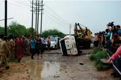  ?? (AP) ?? The overturned vehicle that was carrying Vikas Dubey is towed away near Kanpur yesterday