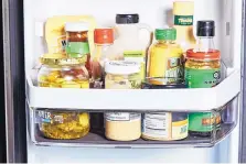 ?? STACY ZARIN GOLDBERG/FOR THE WASHINGTON POST ?? How to get the most out of those condiments in your fridge.