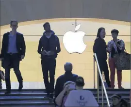  ?? Mark Lennihan
Associated Press ?? APPLE DID NOT break out Watch sales numbers as it does for iPhones, iPads and Macs. Above is an Apple store at New York’s Grand Central Terminal.