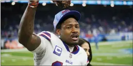  ?? PAUL SANCYA — THE ASSOCIATED PRESS ?? Buffalo Bills wide receiver Stefon Diggs raises a turkey leg after Thursday’s game against the Detroit Lions in Detroit.