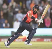 ??  ?? Tom Curran, left, first nailed his yorker to trap Pretorius LBW before Bjorn Fortuin fell from the final ball, with his paddle sweep finding Adil Rashid at fine leg and Moeen Ali’s blitzing innings of 11-ball 39 lifted England.