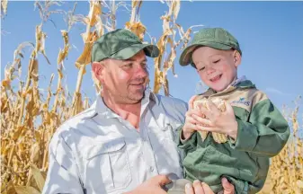  ?? SUPPLIED ?? Dougie Strydom and his son Schoonraad­t. Strydom farms near Hoopstad on the farm Meyerskraa­l, and hopes to leave a legacy that his son can be proud of.