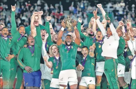  ?? GETTY ?? Siya Kolisi became South Africa’s first black captain to lift the Webb Ellis Cup following the 32-12 win over England in the Rugby World Cup final at Yokohama on Saturday.