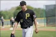  ?? FRANK FRANKLIN II — THE ASSOCIATED PRESS FILE ?? In this Feb. 17, 2020, file photo, Pittsburgh Pirates’ Derek Holland is shown during a spring training baseball workout in Bradenton, Fla. Holland is one of several older players trying to hang on with teams that don’t figure to be contenders in 2020.