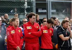  ??  ?? Binotto (centre) said that his vision and that of Vettel’s didn’t match