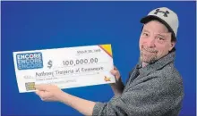  ?? SUBMITTED PHOTO ?? Anthony Timperio, of Ennismore, picks up his $100,000 Encore prize from a ticket bought at Jackson Park Convenienc­e on Parkhill Road.