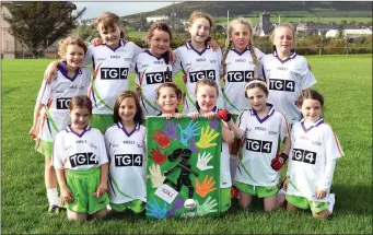  ??  ?? Cumann Peil Ban Daingean Uí Chúis u10 team who played at half time during the Senior Ladies Final Dublin v Mayo in Croke Park at the weekend: Líle Ní Ghairbhí, Ellie Hoare, Robin Ní Chaoinneal­áin, Hannah Granville, Hayley O’Flaherty, Anna Ní Chonchúir,...