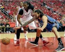  ?? USA TODAY SPORTS ?? Houston Rockets centre Nene Hilario (42) and Oklahoma City Thunder forward Steven Adams (24) reach for a loose ball in the first quarter of game five of the first round of the NBA Playoffs at Toyota Center.
