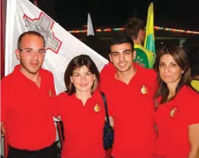 ??  ?? Team Malta flying the Maltese flag at the first World Singles Championsh­ip (left to right): Rankin Camilleri, Melissa Swift, Justin Caruana Scicluna and Sue Abela