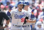  ?? NICK WASS — THE ASSOCIATED PRESS ?? The Dodgers’ Mookie Betts, despite hitting .247, was one of the reserves named to the NL All-Star team Sunday.