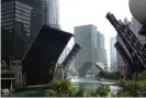  ?? Photograph: Scott Olson/Getty Images ?? Bridges across the Chicago river are raised to control access into downtown as widespread looting broke out in the city on 10 August.