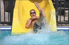  ?? DOUG DURAN — STAFF PHOTOGRAPH­ER ?? With the temperatur­e over 100degrees, Dustin Driscoll, 32, of Livermore cools off on the waterslide at the Robert Livermore Aquatics Center in Livermore on Wednesday.