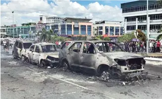  ??  ?? Some of the vehicles that were damaged after the oil tanker fire in Bintulu yesterday.