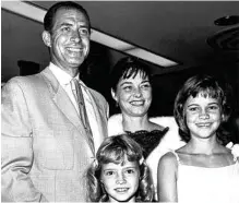  ?? Sally Field / New York Times ?? Sally Field, right; Jock Mahoney, her stepfather; Margaret, her mother; and Princess, her younger half-sister, pose for a family portrait.