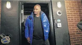  ?? ABEL URIBE/CHICAGO TRIBUNE ?? R. Kelly emerges from his studio before turning himself in to Chicago police Feb. 22, 2019.