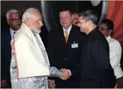  ??  ?? Puneet Kundal (Consul General, Cape Town), welcomes Indian Prime Minister Modi on his arrival in Durban. Looking on (extreme left) is Human Settlement­s MEC Ravi Pillay