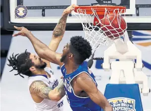  ?? GERALD HERBERT/THE ASSOCIATED PRESS ?? The Georgia State Panthers, boosted by a dunk from D'Marcus Simonds, punched their tournament ticket by beating the Texas-Arlington Mavericks to win the Sun Belt Conference.