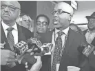  ?? THE COMMERCIAL APPEAL ?? Memphis City Councilman Martavius Jones speaks to reporters after he and council members Joe Brown, Jamita Swearengen and Patrice Robinson walked out of a City Council meeting on Tuesday over the District 1 City Council seat appointmen­t. JAMIE MUNKS /