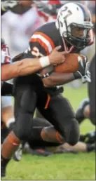  ?? Trentonian File Photo ?? Pennsbury and running back Ronquay Smith (above) will have their hands full with Abington.