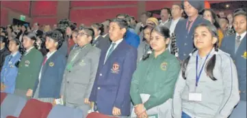  ??  ?? Students observing a minute’s silence to commemorat­e Martyrs’ Day.