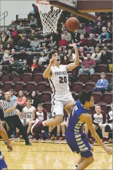  ?? Bud Sullins/Special to Siloam Sunday ?? Siloam Springs sophomore Murphy Perkins drives to the basket during the second half Friday against Harrison. The Goblins defeated the Panthers 75-64.