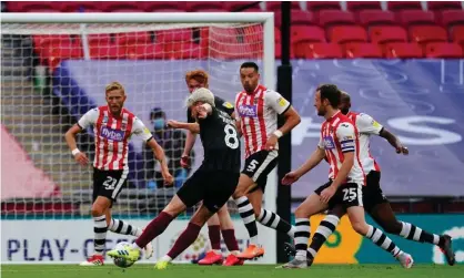  ??  ?? Ryan Watson sets Northampto­n on their way with the first goal Photograph: Javier García/BPI/REX/Shuttersto­ck