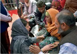  ?? — PTI ?? Jammu and Kashmir chief minister Mehbooba Mufti meets the displaced families and victims of cross- border shelling in Poonch sector of Jammu on Monday.