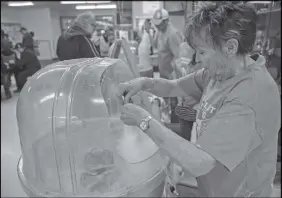  ?? CP PHOTO ?? Cotton candy is sold to raise funds for the Humboldt Broncos during Game 1 of the Saskatchew­an Junior Hockey League final between the Estevan Bruins and Nipawin Hawks in Nipawin, Sask., on Saturday.