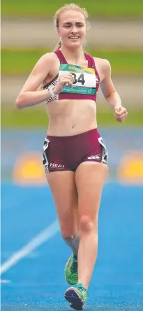  ??  ?? Katie Hayward wins the 10,000m race walk title in Sydney.