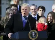  ?? MANUEL BALCE CENETA — ASSOCIATED PRESS ?? In the Rose Garden at he White House, President Donald Trump speaks to participan­ts of the annual March for Life.