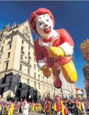  ??  ?? The Ronald McDonald balloon floats down Central Park West in New York during the 91st Annual Macy’s Thanksgivi­ng Day Parade