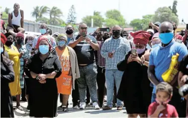  ??  ?? PAYING RESPECTS: Scores of people lined the streets between Gelvandale and New Brighton yesterday to pay their respects to slain taxi driver Garrison Snayers